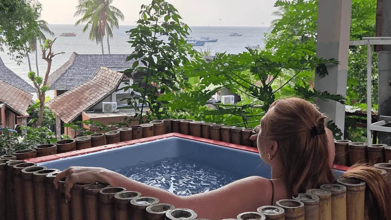 A guest resting in the ice bath at Blue Chitta, Koh Tao