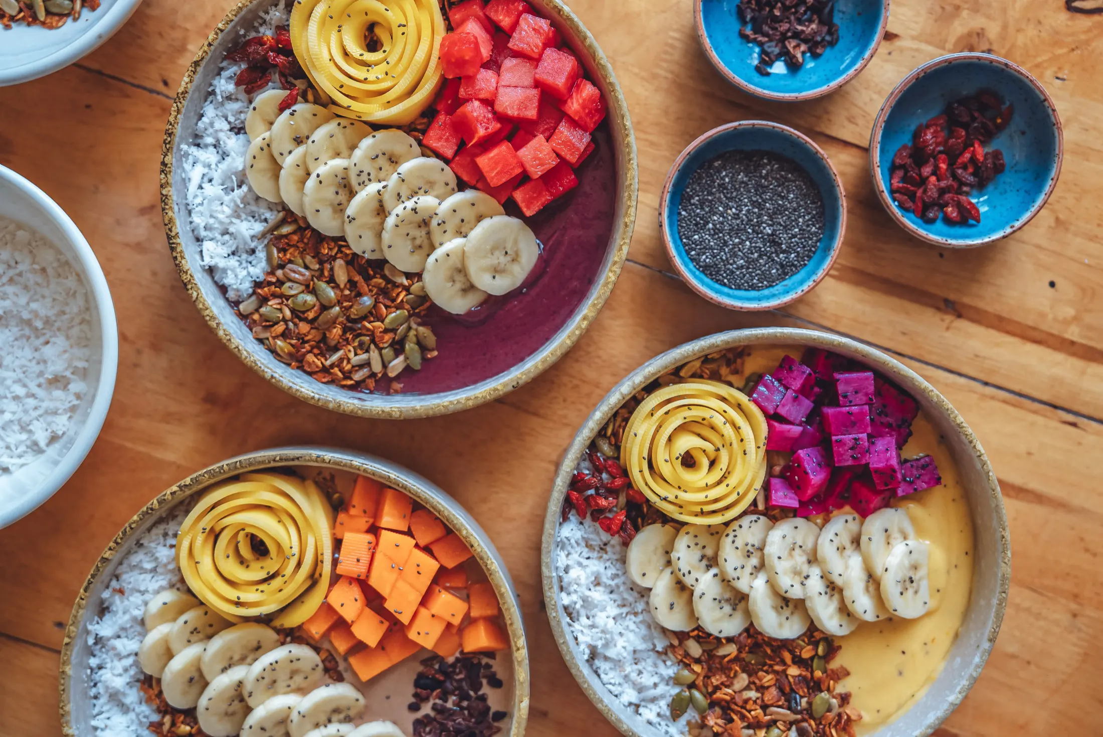Smoothie bowls with fresh mango, dragon fruit and banana at Prana Café, Koh Tao