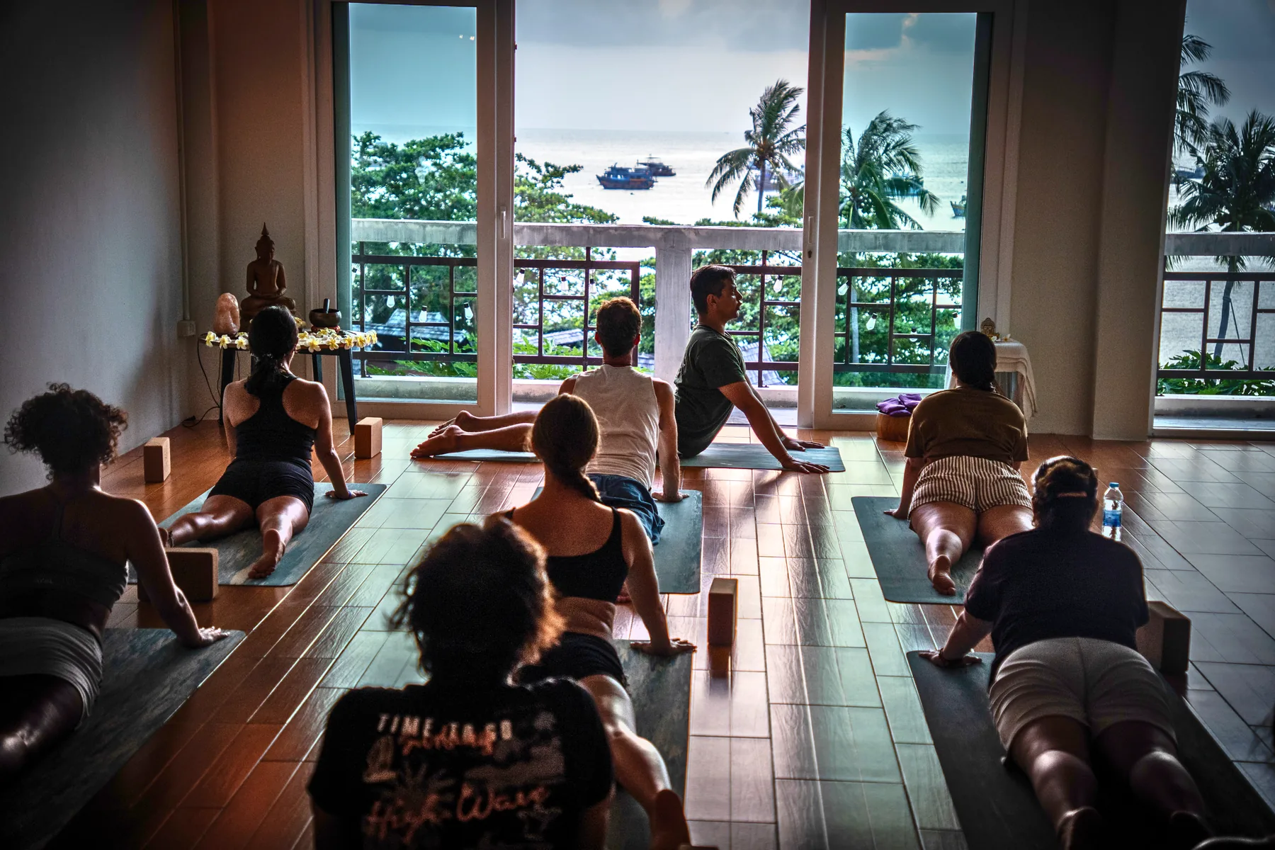 A yoga class in the sea-view shala at Blue Chitta