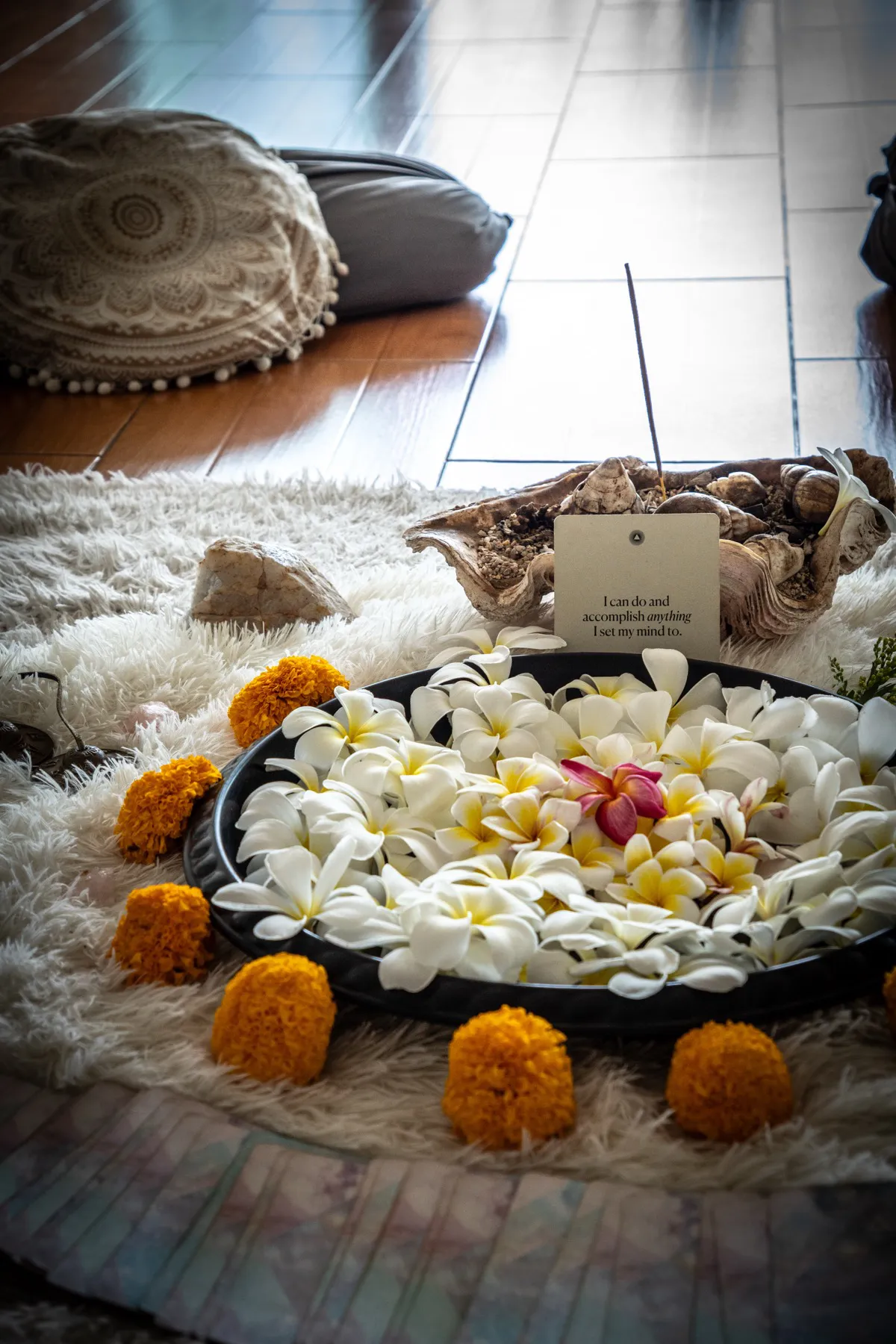 Flower altar with frangipani and marigolds for a moon ceremony