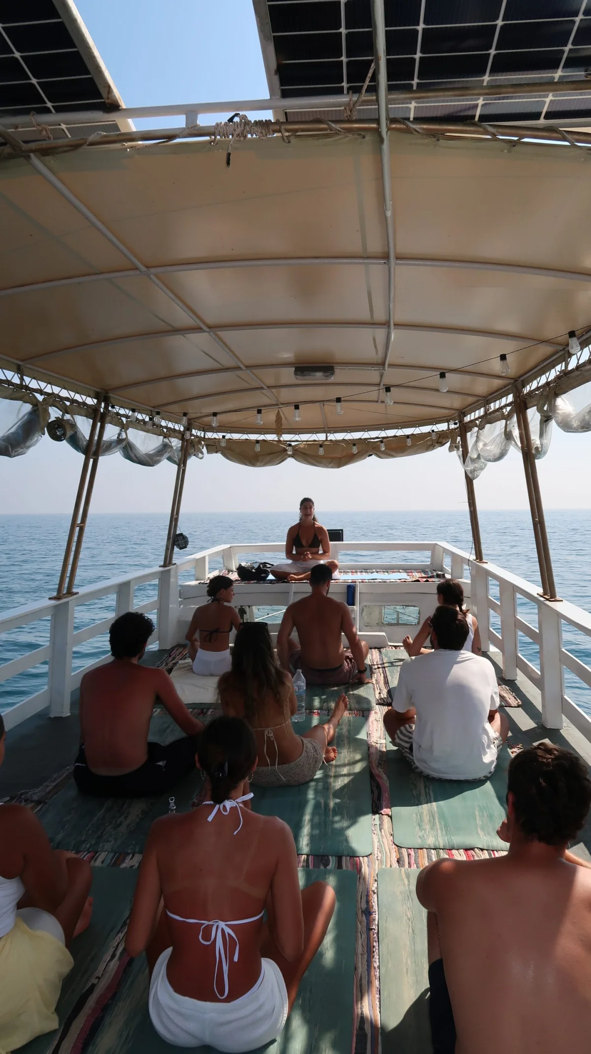 A group practising on a boat near Koh Tao